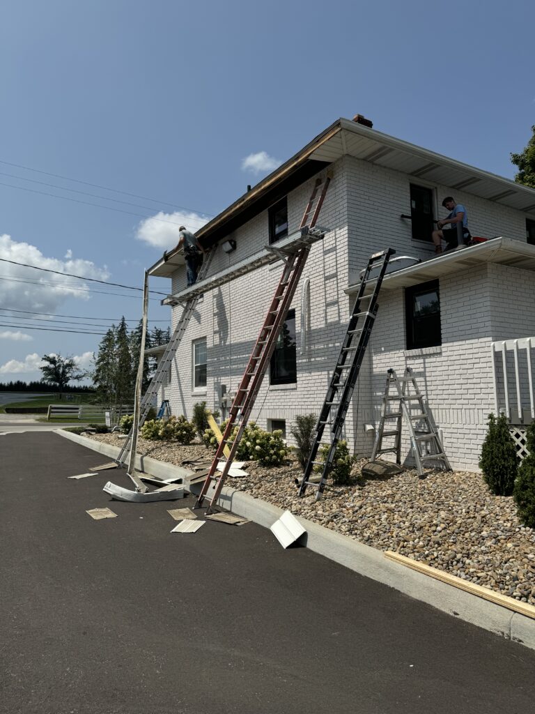 completing exterior finishes on custom home addition in fort worth